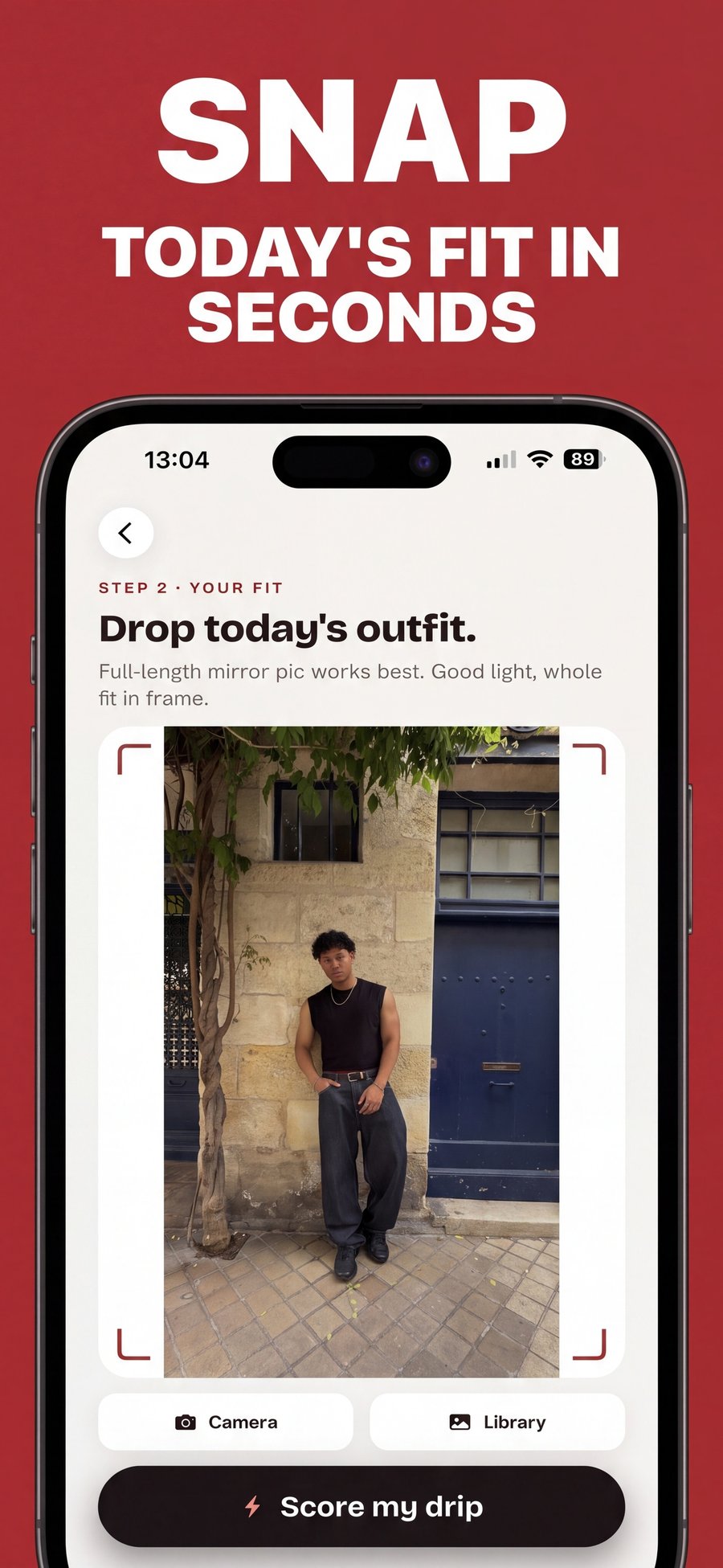 Snap today's fit in seconds: the upload screen with a full-length outfit photo and a Score my drip button.